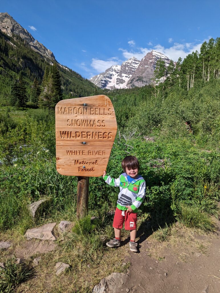 toddler so happy to be hiking